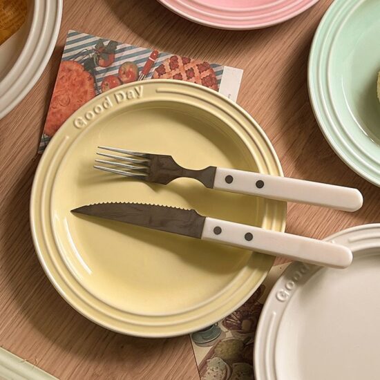 Cream embossed ceramic dessert and breakfast plate with letter design