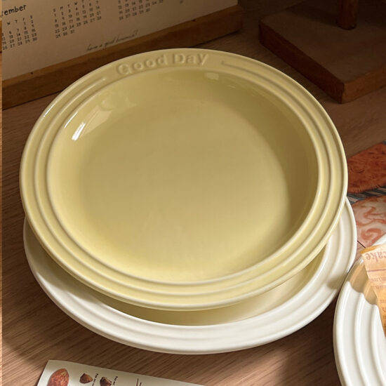 Cream embossed ceramic dessert and breakfast plate with letter design