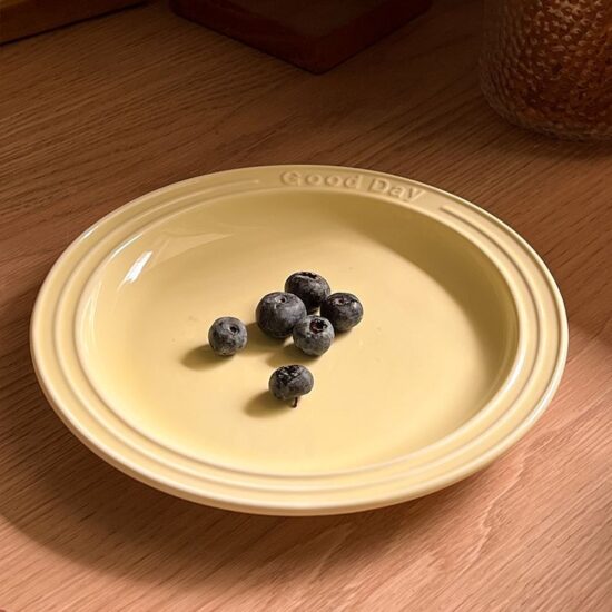 Cream embossed ceramic dessert and breakfast plate with letter design