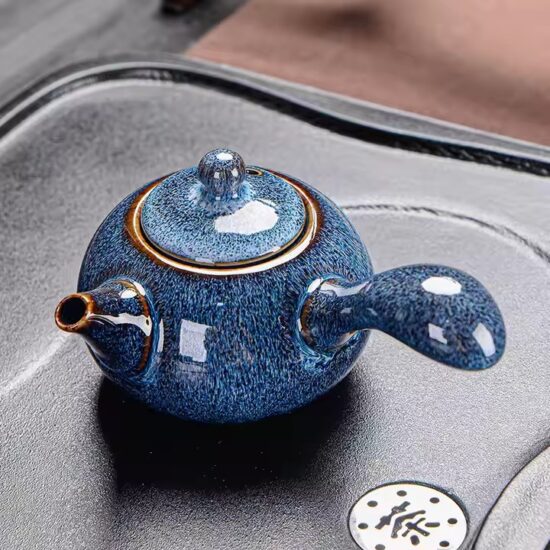 Ceramic home teapot with elegant spout and handle design