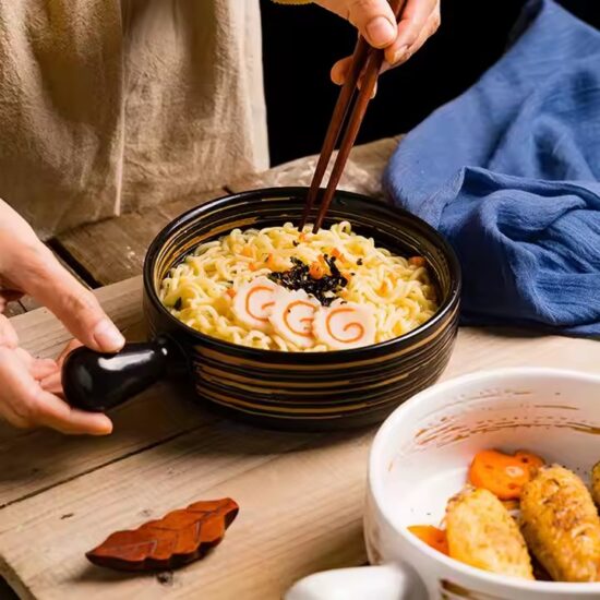 Comfortable ceramic bowl with ergonomic handle for hot food and daily home dining