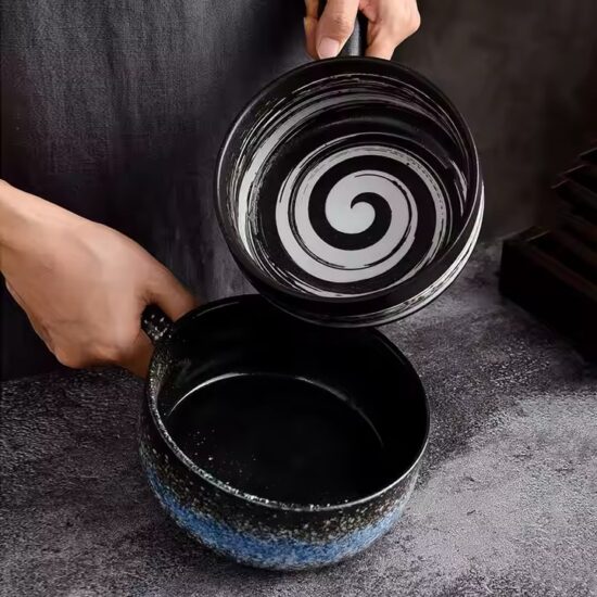 Comfortable ceramic bowl with ergonomic handle for hot food and daily home dining