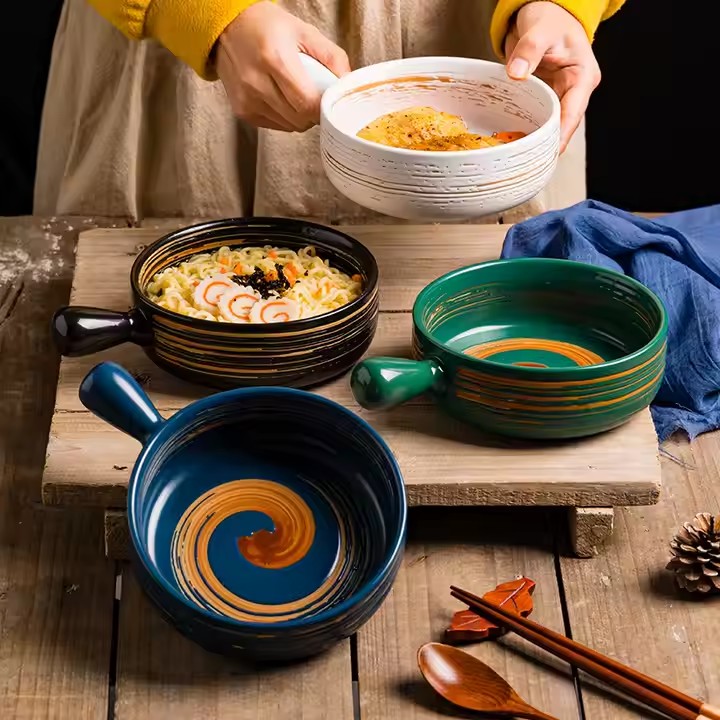 Comfortable ceramic bowl with ergonomic handle for hot food and daily home dining