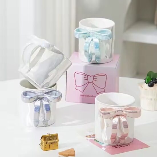 Pearl glaze ceramic mug with creative bowknot design for stylish gifting

