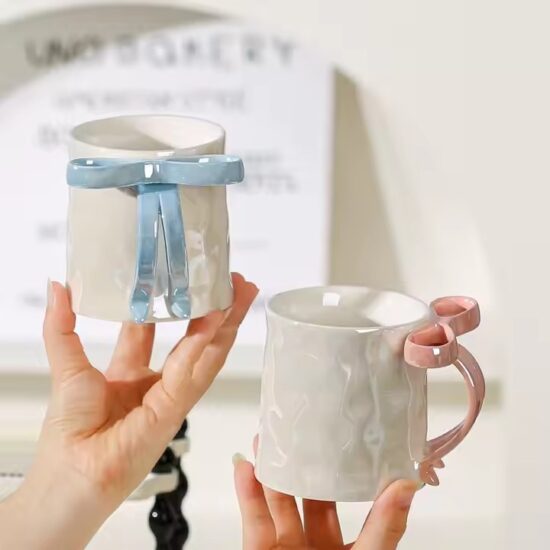 Pearl glaze ceramic mug with creative bowknot design for stylish gifting

