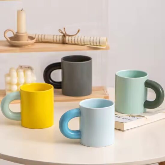 Creative thick-handle ceramic mug in modern design for home or office

