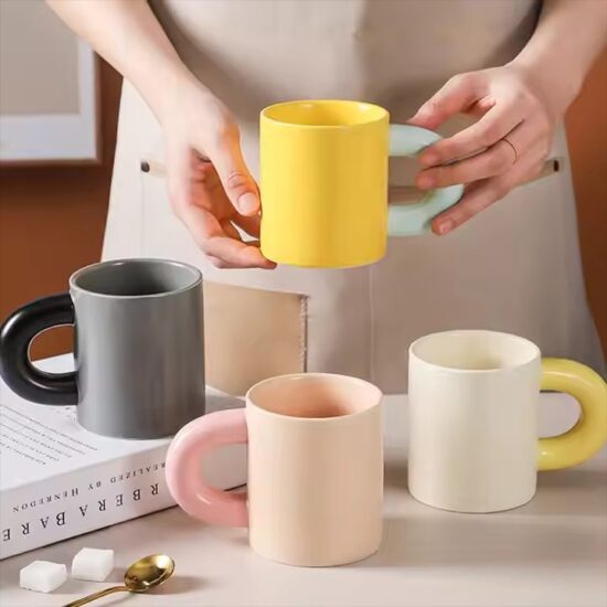 Creative thick-handle ceramic mug in modern design for home or office

