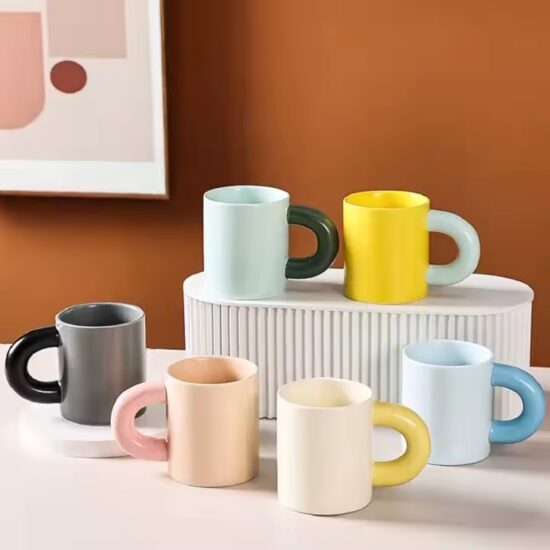 Creative thick-handle ceramic mug in modern design for home or office