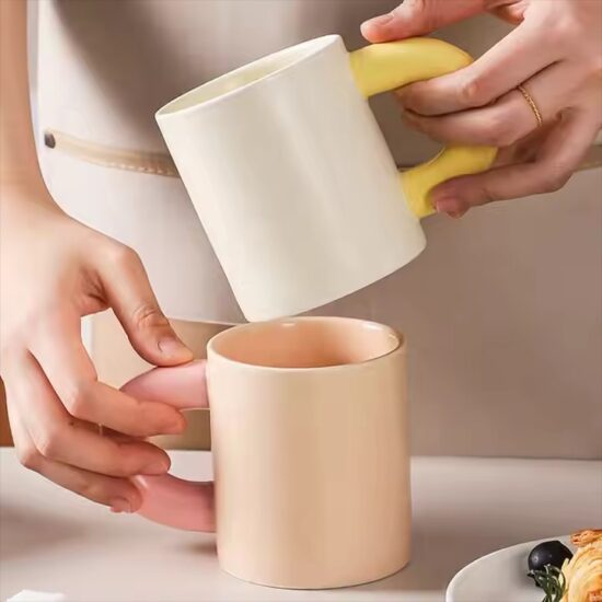 Creative thick-handle ceramic mug in modern design for home or office


