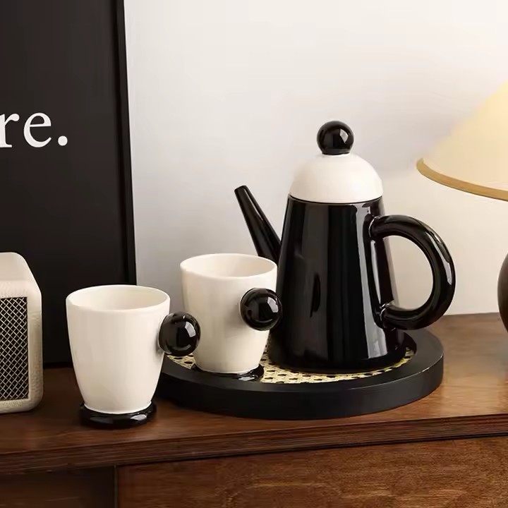 Home ceramic teapot set with cups and tray for elegant tea serving