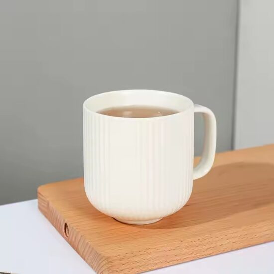 Modern ceramic mug with embossed striped texture for everyday use