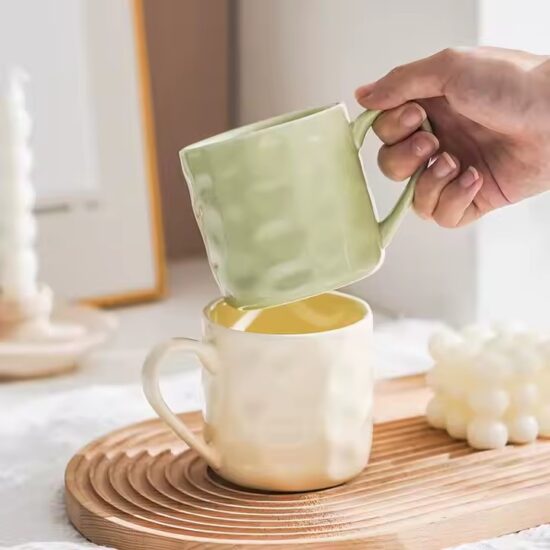 Personalized handmade ceramic coffee mug with artistic glaze and custom design