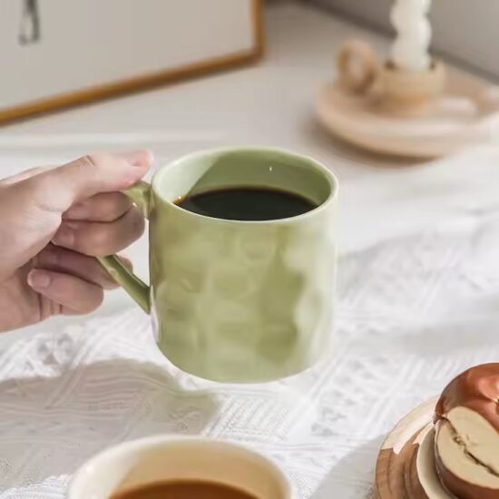 Personalized handmade ceramic coffee mug with artistic glaze and custom design