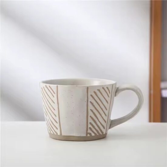 Personalized handmade ceramic coffee mug with artistic glaze and custom design