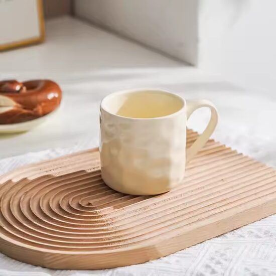 Personalized handmade ceramic coffee mug with artistic glaze and custom design