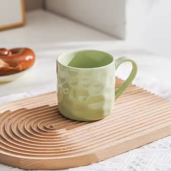 Personalized handmade ceramic coffee mug with artistic glaze and custom design