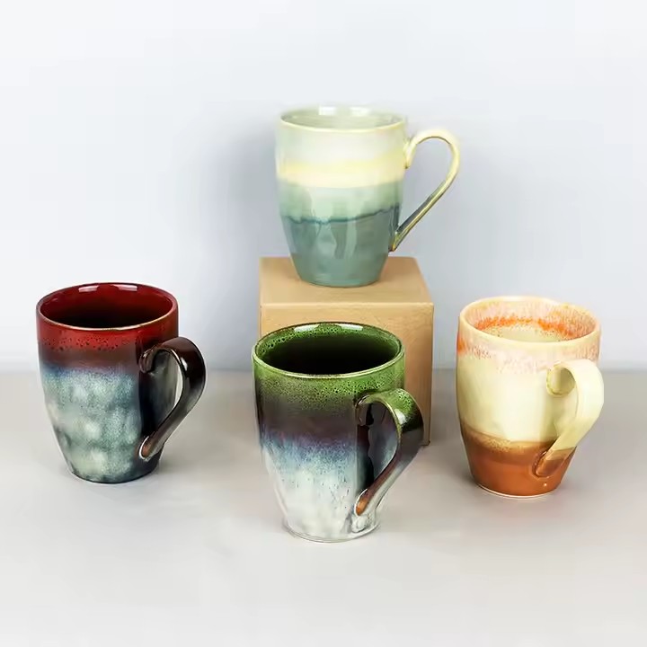 Modern ceramic coffee cup with glossy finish and ergonomic handle design