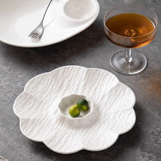 Ceramic dumpling plate with integrated dipping sauce dish for modern dining