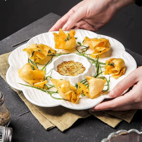 Ceramic dumpling plate with integrated dipping sauce dish for modern dining