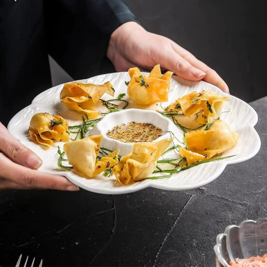 Ceramic dumpling plate with integrated dipping sauce dish for modern dining
