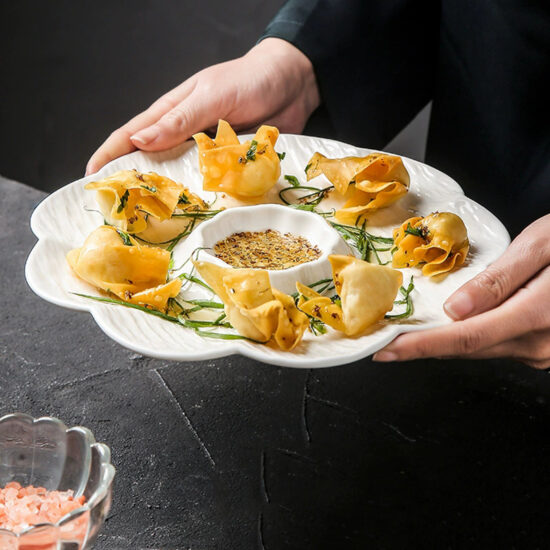 Ceramic dumpling plate with integrated dipping sauce dish for modern dining