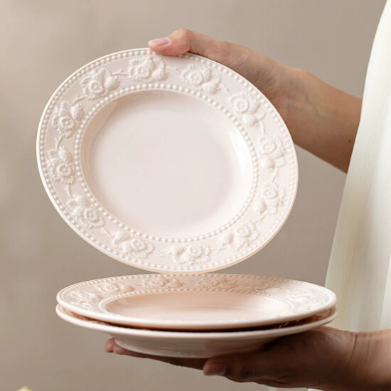 Solid color embossed ceramic dinner plate for Western food presentation