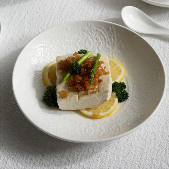 Solid color embossed ceramic dinner plate for Western food presentation