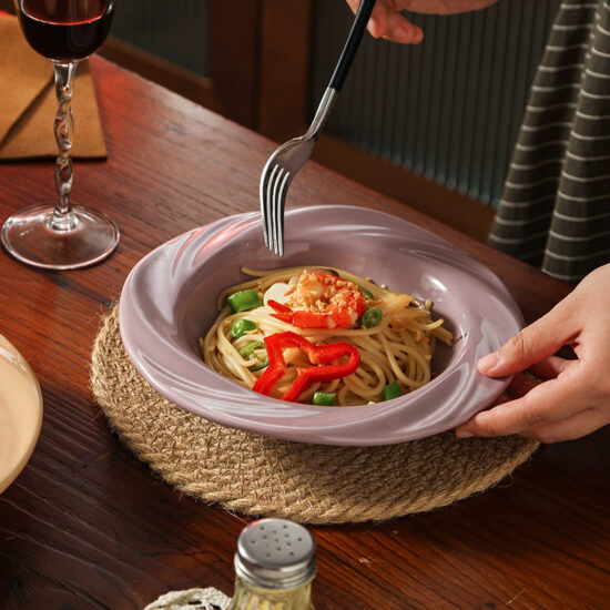 Cream-style ceramic dinner plate with elegant design