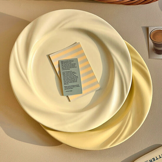 Cream-style ceramic dinner plate with elegant design
