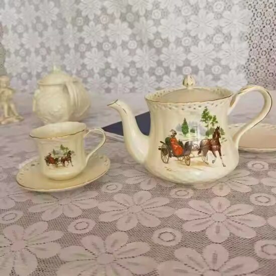Vintage English Ceramic Teapot with Elegant Handle and Floral Pattern