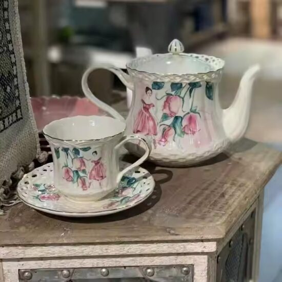 Vintage English Ceramic Teapot with Elegant Handle and Floral Pattern