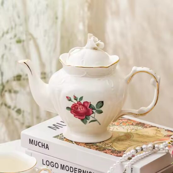 Vintage English Ceramic Teapot with Elegant Handle and Floral Pattern