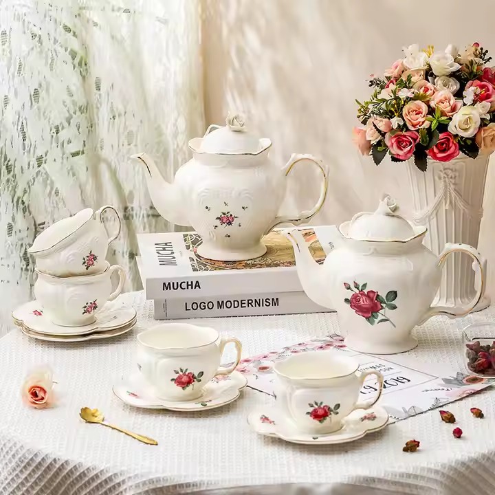 Vintage English Ceramic Teapot with Elegant Handle and Floral Pattern