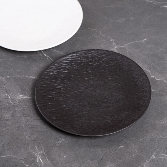 Vintage Japanese-style round ceramic dinner plate for home or café