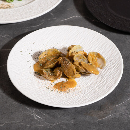 Vintage Japanese-style round ceramic dinner plate for home or café