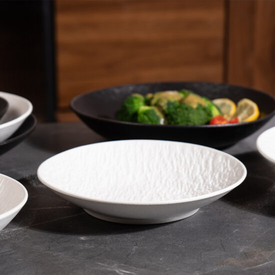 Vintage Japanese-style round ceramic dinner plate for home or café