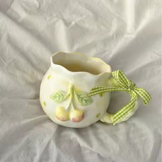 Irregular shape ceramic mug with high aesthetic design in pastel glaze


