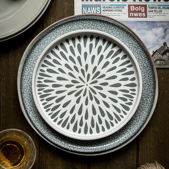 Reactive glaze ceramic dinner plate with handcrafted finish for stylish dining