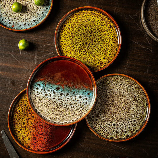Reactive glaze ceramic dinner plate with handcrafted finish for stylish dining