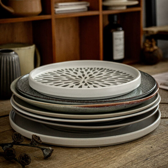 Reactive glaze ceramic dinner plate with handcrafted finish for stylish dining