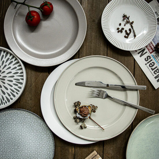 Reactive glaze ceramic dinner plate with handcrafted finish for stylish dining