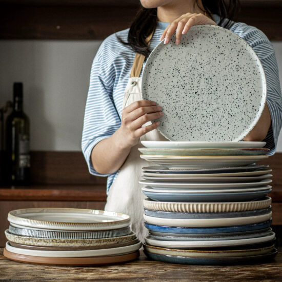 Reactive glaze ceramic dinner plate with handcrafted finish for stylish dining