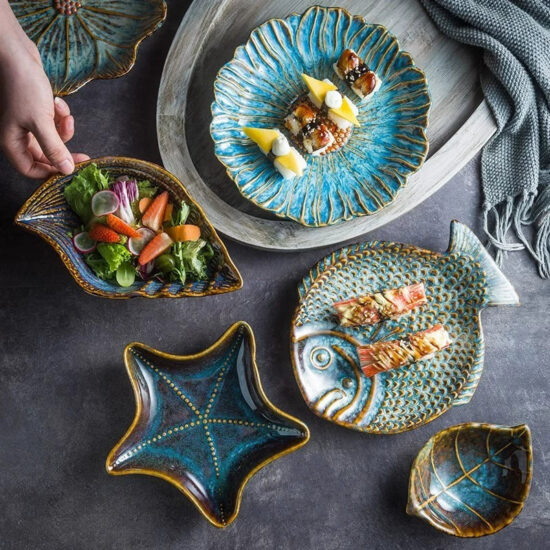 Creative shell-shaped ceramic plates with conch and sea-inspired design